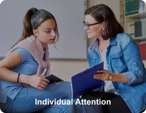 Teacher guiding students during an interactive coaching session