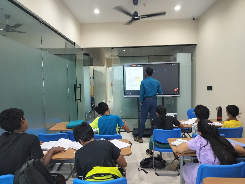 Students in Catalyst Classes academic programs session with interactive smart board in Hyderabad